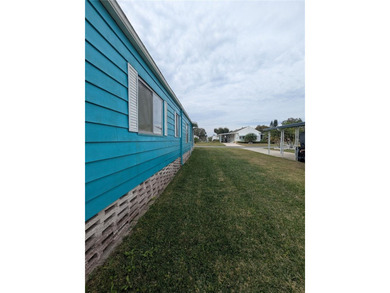 This lovely home is located in a 55+ community where you own - photo 32