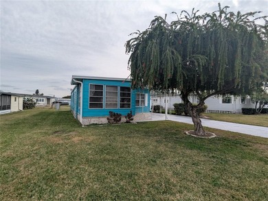 This lovely home is located in a 55+ community where you own - photo 33