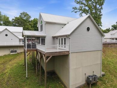 Built in 2023, this lakefront condo at Green Turtle Bay Resort & - photo 35