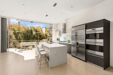 Welcome home to 140 Clinton Avenue, a meticulously maintained - photo 2