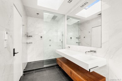 Welcome home to 140 Clinton Avenue, a meticulously maintained - photo 9