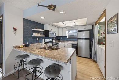 Welcome to this beautifully updated lakefront condo in one of - photo 3