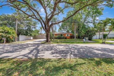 Lake Home For Sale in West Park, Florida