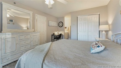 Wake up to peaceful cove views from your screened deck at this - photo 10