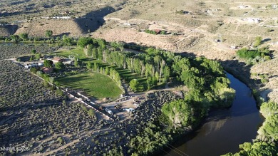 A rare riverfront retreat, tucked away and truly private. Set on - photo 16