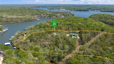 Privacy, acreage, and lakefront living come together at this - photo 2