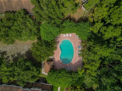Tucked away in a beautifully maintained gated community just - photo 25