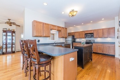 Situated at 12 Cedar Dr in Webster, MA, United States, this - photo 4