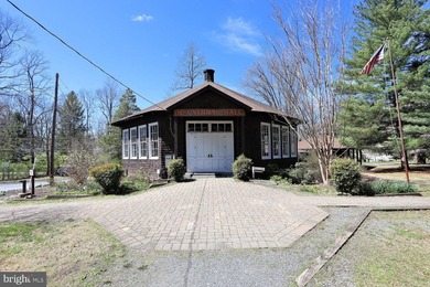 Nestled in the charming community of Washington Grove, this - photo 49