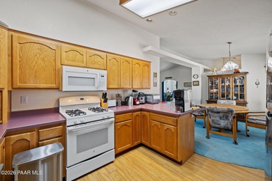 Welcome to 1357 N Rustlers Roost, a spacious and highly