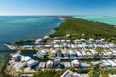 A striking new construction waterfront residence, offering a