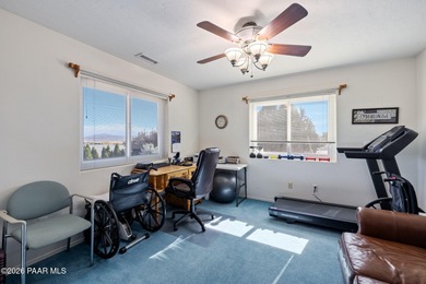 Welcome to 1357 N Rustlers Roost, a spacious and highly