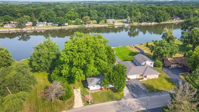 RARE TURNKEY ROCK RIVER COTTAGE! Fully renovated 3 bedroom, 1 - photo 1