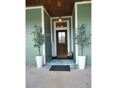 Experience a private country retreat with a winding paved - photo 4