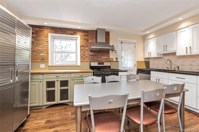 **Beautifully Renovated Brick Townhome in Beechhurst** Welcome - photo 4