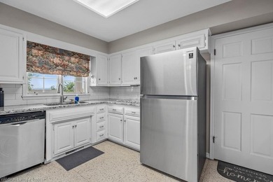 Exceptional value in PRIME LOCATION! This updated brick home on - photo 8