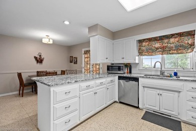Exceptional value in PRIME LOCATION! This updated brick home on - photo 9
