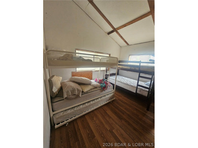 Lakefront investment opportunity! This 3-bedroom, 1-bath home - photo 9
