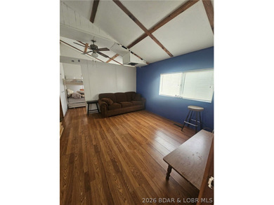 Lakefront investment opportunity! This 3-bedroom, 1-bath home - photo 10