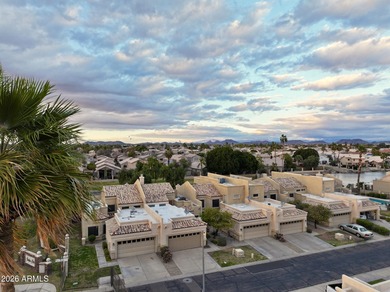 Located in the desirable gated community of Port Royale, this - photo 2