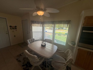 This well cared for 2-bedroom, 2 bathrooms Palm Harbor home - photo 4