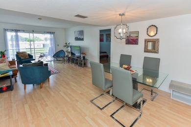 Top-Floor Condo with Serene Lake Views in Gated 55+ Golden Lakes - photo 12