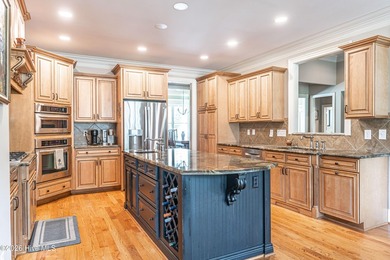 Sprawling, golf-front estate home in the gated community of Mid - photo 10
