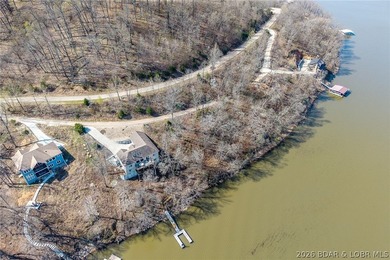 Lake Front lot ready for your dream home build! Located at the - photo 4