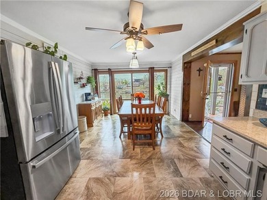 Lake of the Ozarks waterfront property featuring natural stone - photo 6