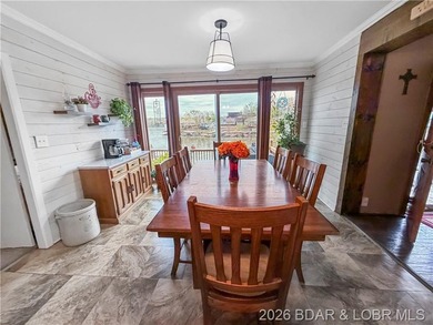 Lake of the Ozarks waterfront property featuring natural stone - photo 7