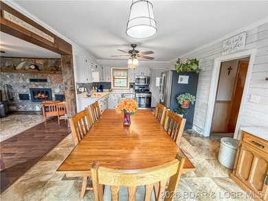 Lake of the Ozarks waterfront property featuring natural stone - photo 8