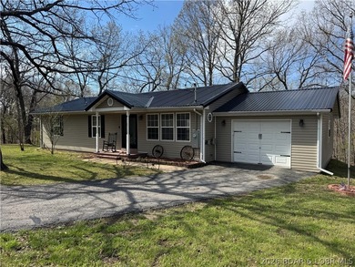 Set on nearly 5 acres, this property offers the rare blend of - photo 1