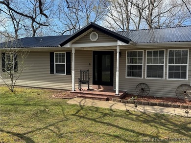 Set on nearly 5 acres, this property offers the rare blend of - photo 4