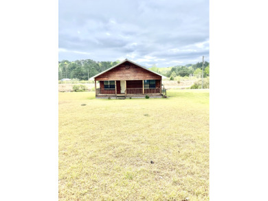 MOTIVATED SELLERS:  Rustic Home With Front Porch On Quiet Road - photo 2