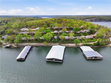 Wake up to beautiful lake sunrises at this turnkey retreat on - photo 1