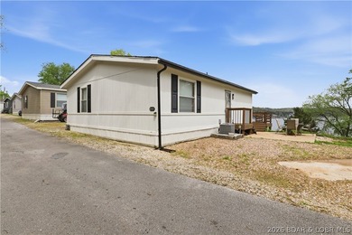 Wake up to beautiful lake sunrises at this turnkey retreat on - photo 3