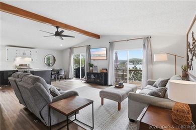 Wake up to beautiful lake sunrises at this turnkey retreat on - photo 4