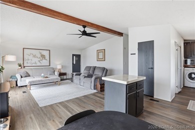 Wake up to beautiful lake sunrises at this turnkey retreat on - photo 5