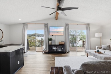 Wake up to beautiful lake sunrises at this turnkey retreat on - photo 6