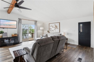 Wake up to beautiful lake sunrises at this turnkey retreat on - photo 7