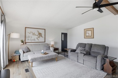 Wake up to beautiful lake sunrises at this turnkey retreat on - photo 8