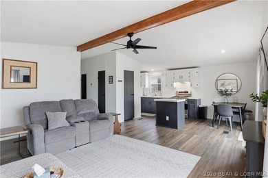 Wake up to beautiful lake sunrises at this turnkey retreat on - photo 10