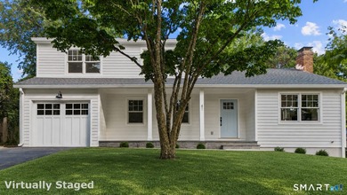 Welcome home to this fully renovated Colonial in one of - photo 1