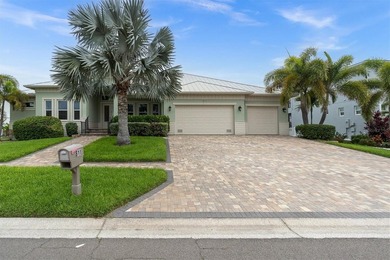 Welcome to 811 Birdie Way, a stunning custom-built waterfront - photo 2