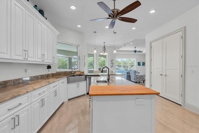 Welcome to 811 Birdie Way, a stunning custom-built waterfront - photo 5