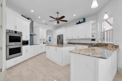 Welcome to 811 Birdie Way, a stunning custom-built waterfront - photo 6