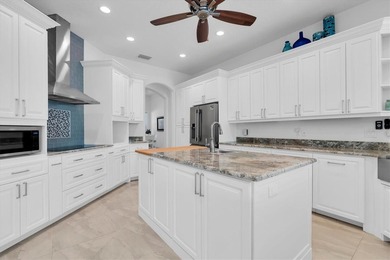 Welcome to 811 Birdie Way, a stunning custom-built waterfront - photo 7