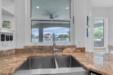 Welcome to 811 Birdie Way, a stunning custom-built waterfront - photo 8