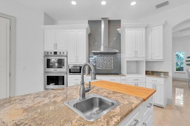 Welcome to 811 Birdie Way, a stunning custom-built waterfront - photo 9