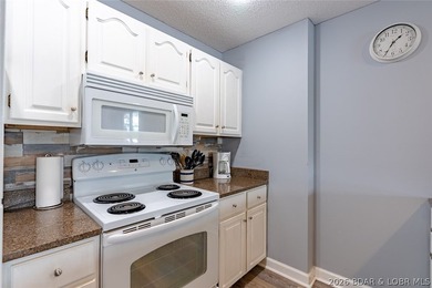 Imagine waking up to miles of sparkling lake views stretching - photo 8